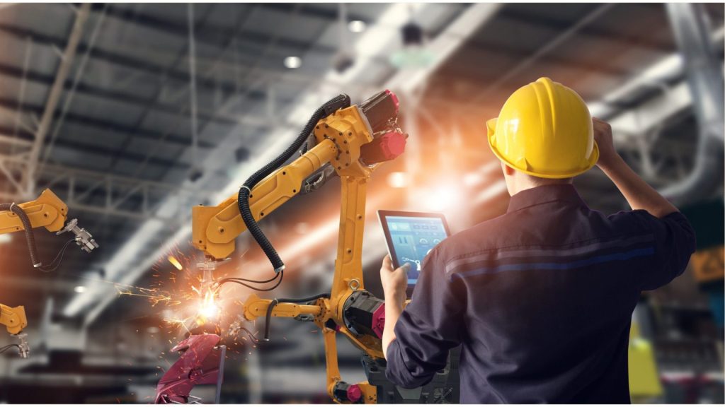 man with tablet and machine, qooling