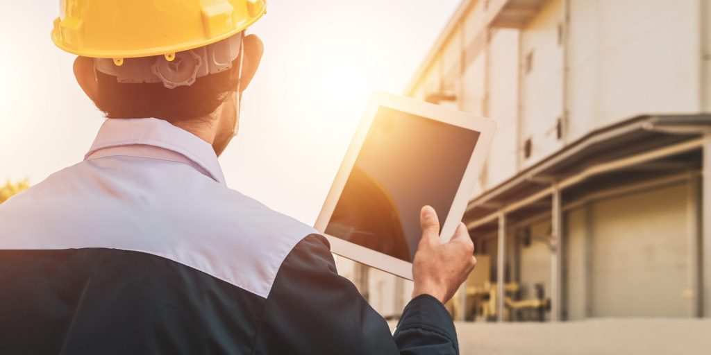 worker with a tablet, QHSE Management Platform Implementation