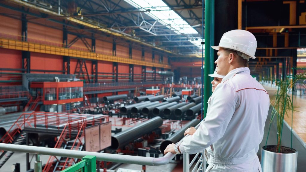 Man walking in a manufacture of streamlining audit preparation process